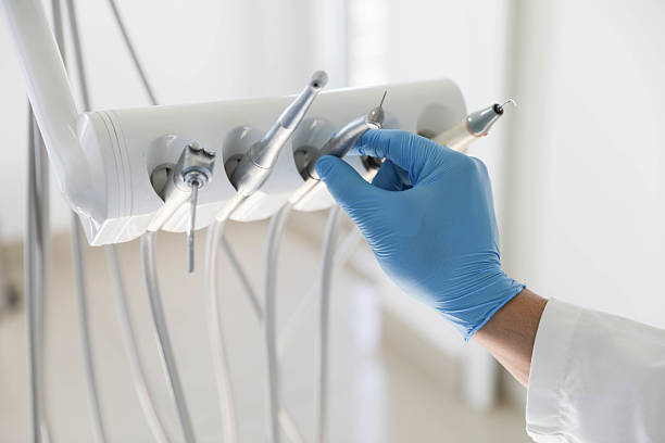 Professional Tooth Extraction technician working in Edmond, OK